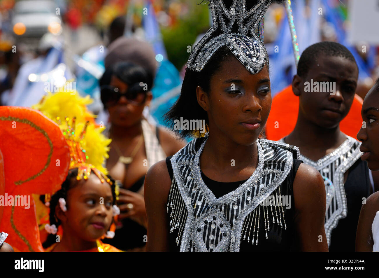 Beautiful black children and teen masqueraders in the street with a Mas band at the Junior Caribana Festival Toronto 2008 Stock Photo