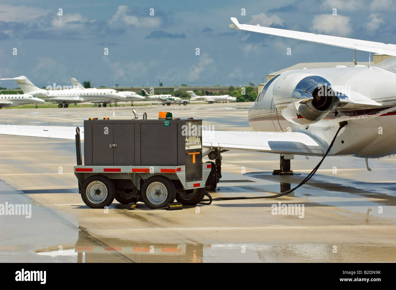 airport runway landing strip tarmac touchdown markers marking arrow direction Stock Photo