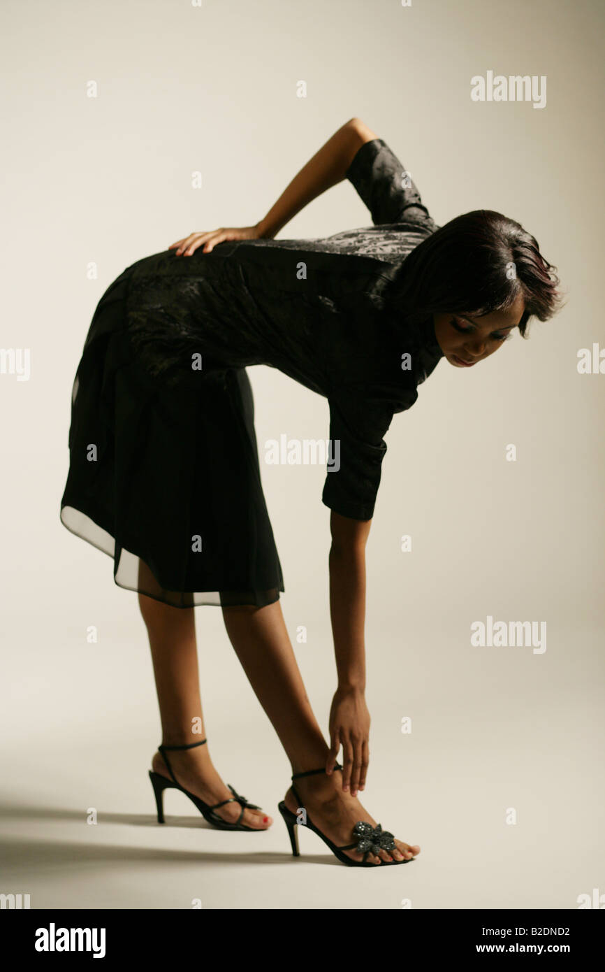 Woman Bent Over Bending Over High Resolution Stock Photography and