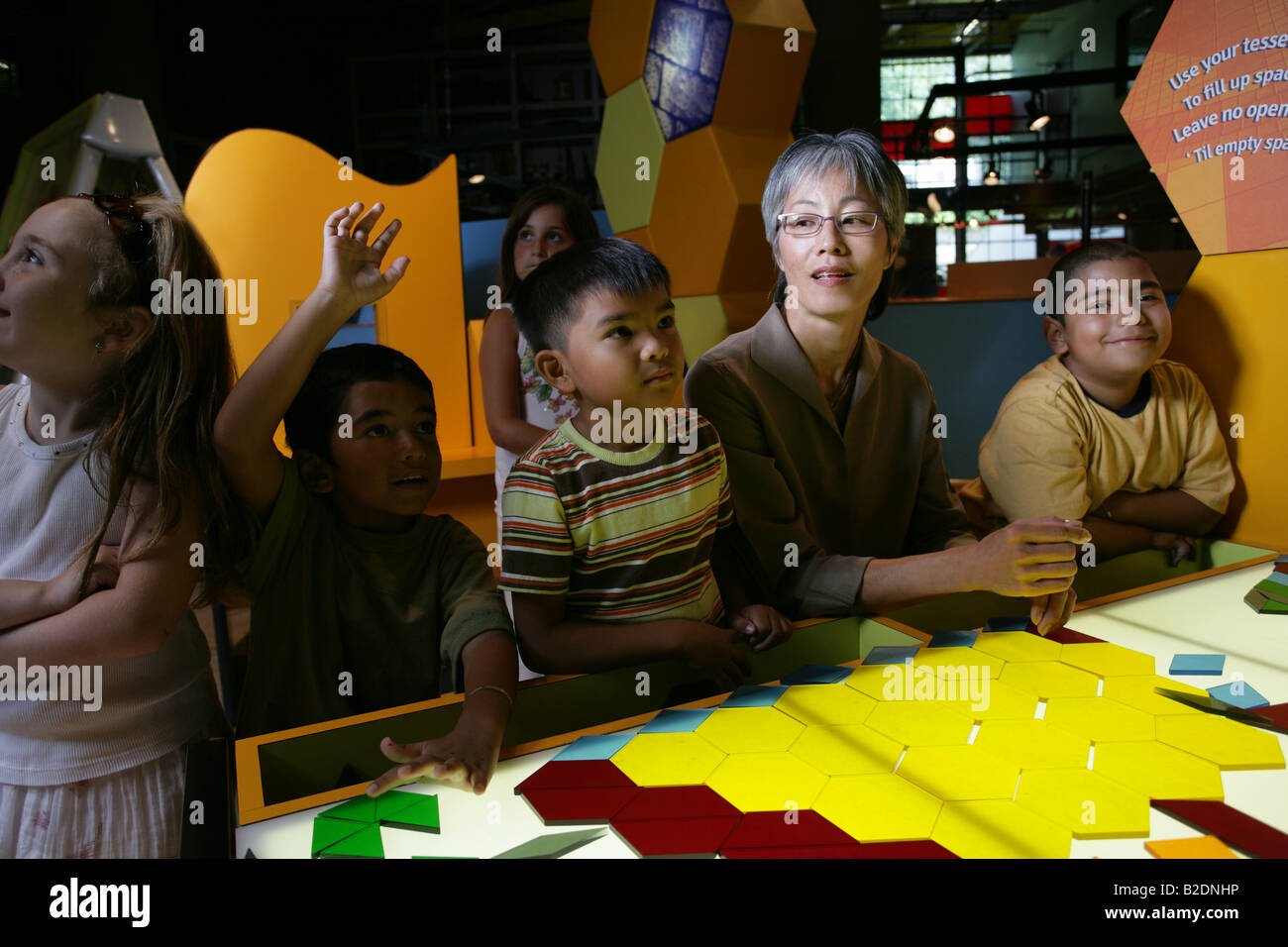 Students and art teacher in art class Stock Photo - Alamy