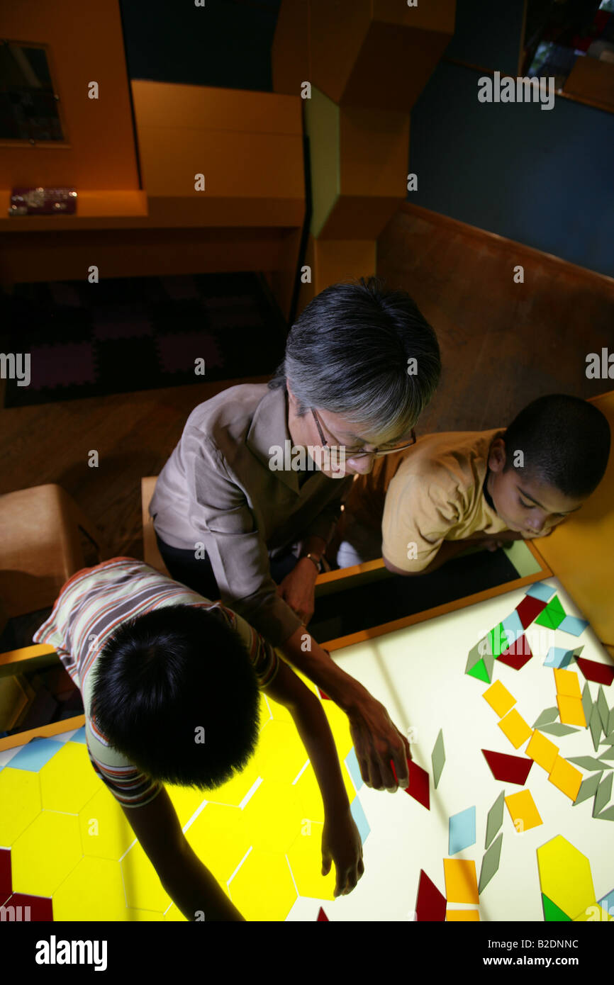 Students and art teacher in art class Stock Photo - Alamy