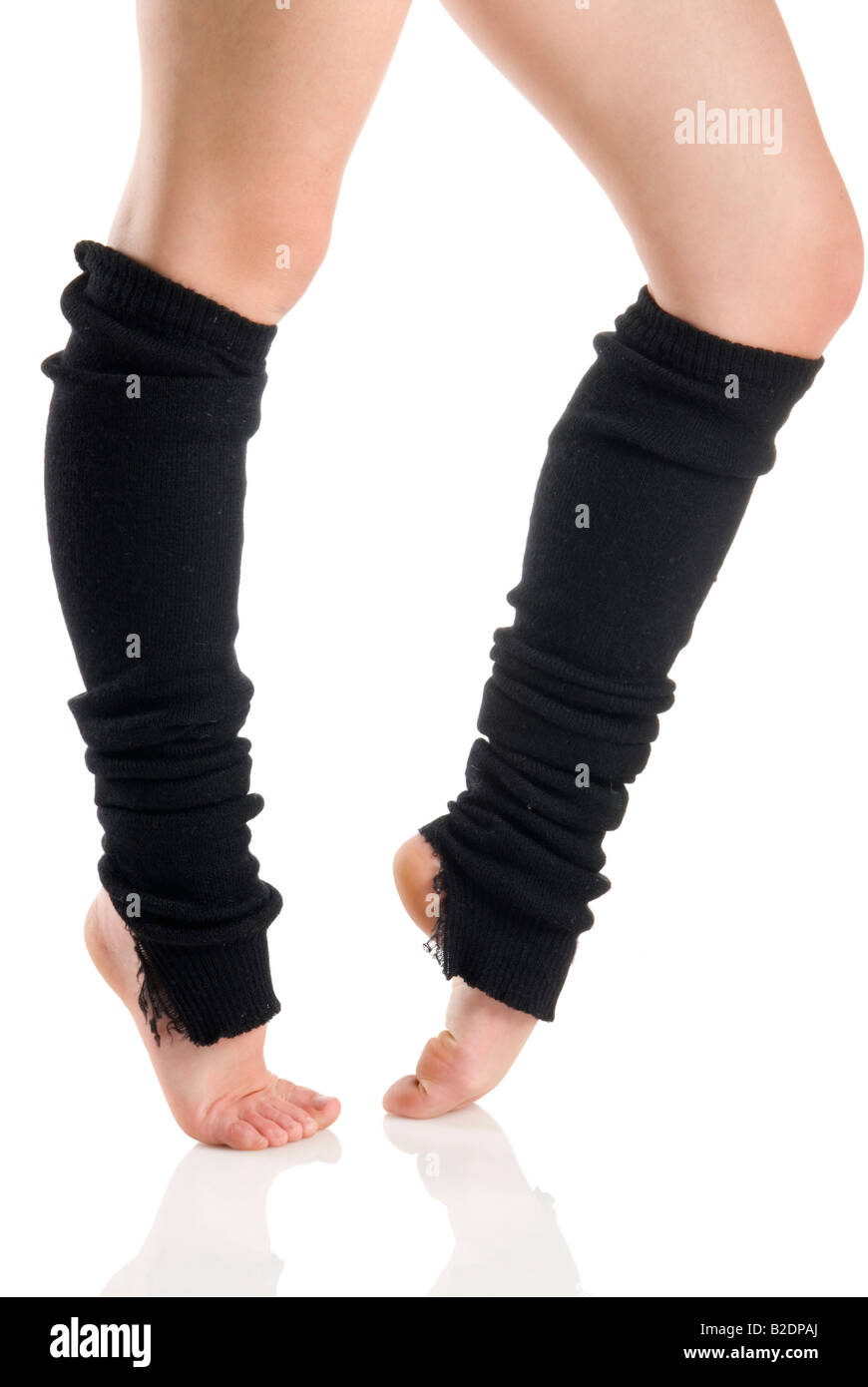 legs in black knee socks warming up Stock Photo