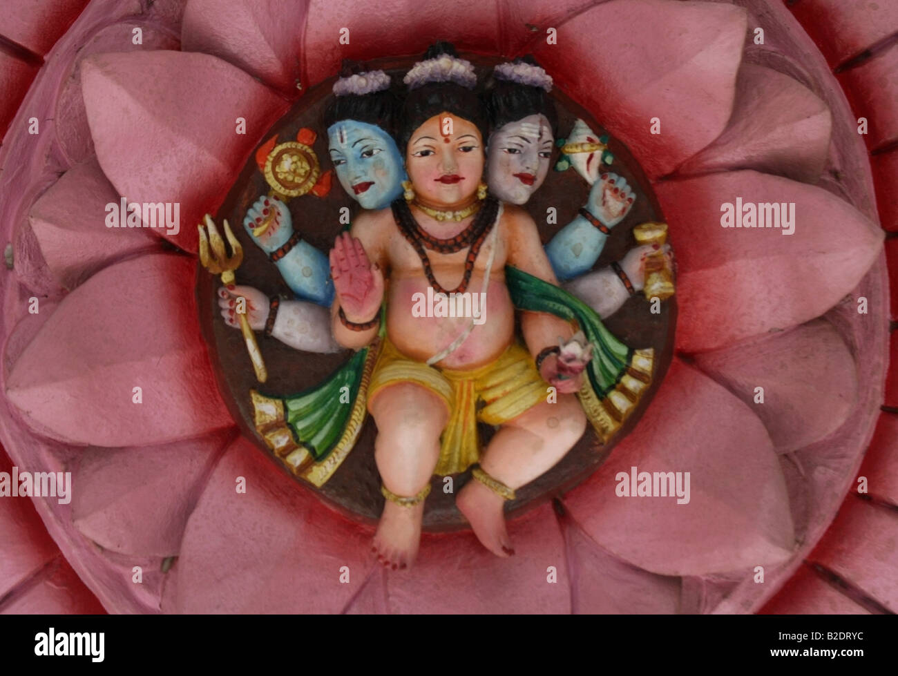 Trimurti,  Brahma  Vishnu  and Shiva, the Hindu trinity depicted on the ceiling of a Hindu temple, India Stock Photo