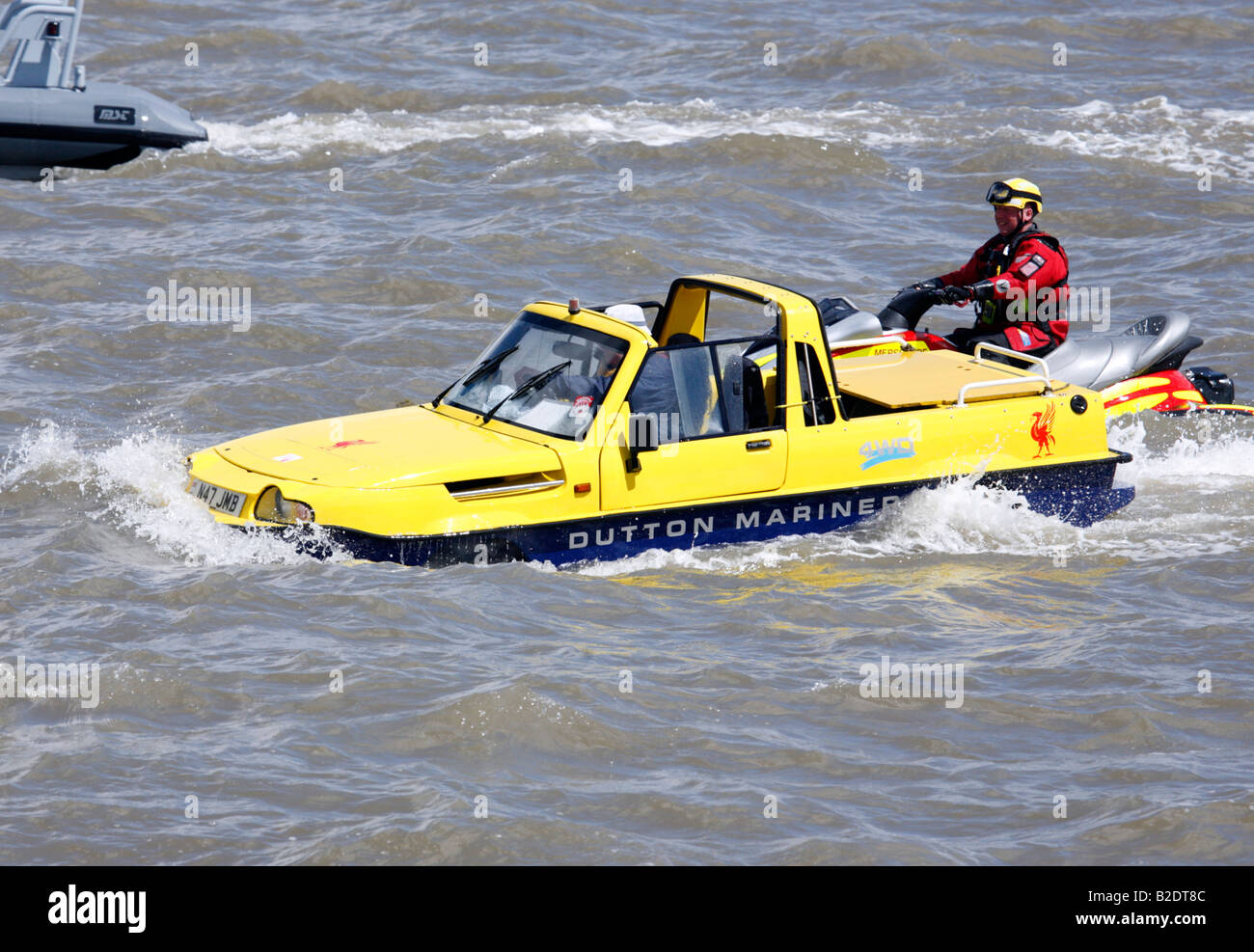 Dutton Mariner Amphibious Car with Lifeguard on jet ski in attendance