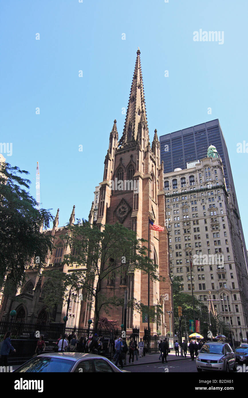 Trinity Church from Wall Street - New York City, USA Stock Photo