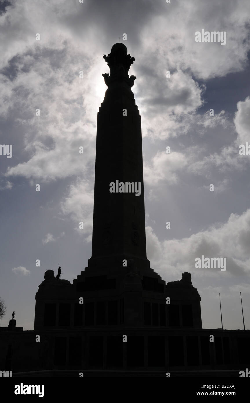 Royal Navy War Memorial on Plymouth Hoe England sihouetted against the sun Stock Photo