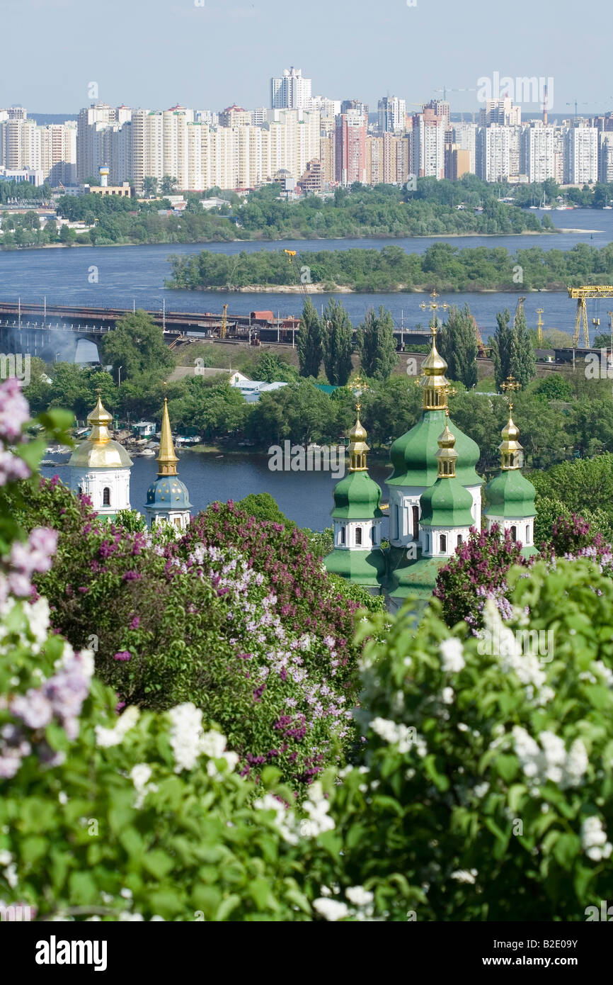 Blooming modern and ancient Kiev Ukraine Vidubichy manastery over the Dnipro river Stock Photo