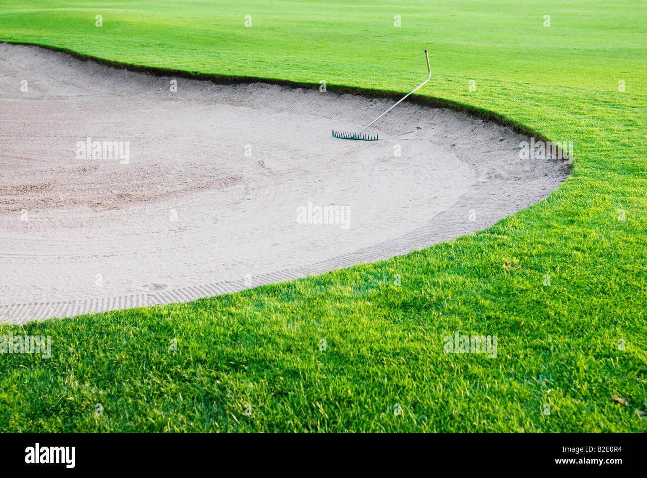 Sand trap in a golf course Stock Photo Alamy