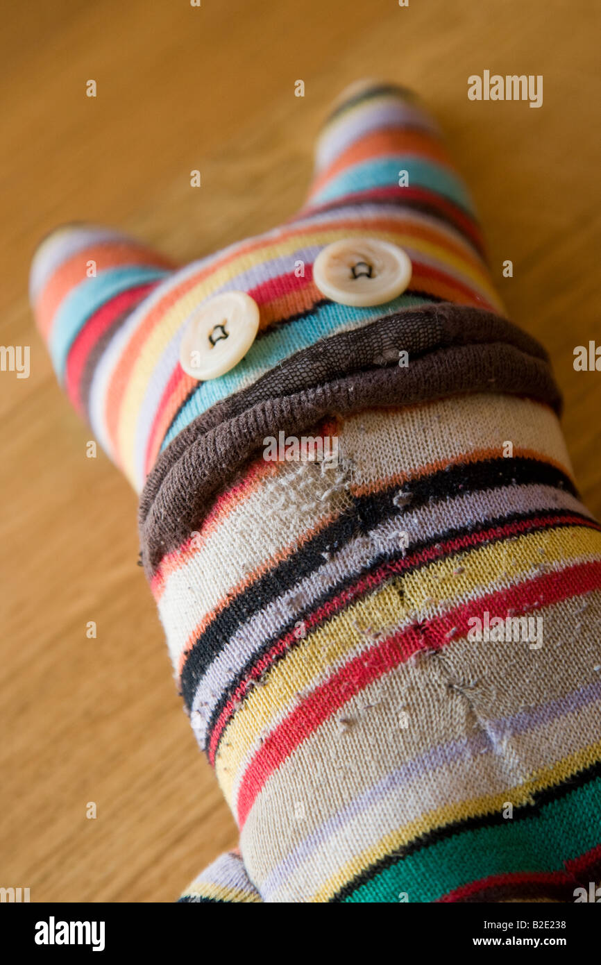 Hand made sock puppet toy with buttons for eyes Stock Photo Alamy