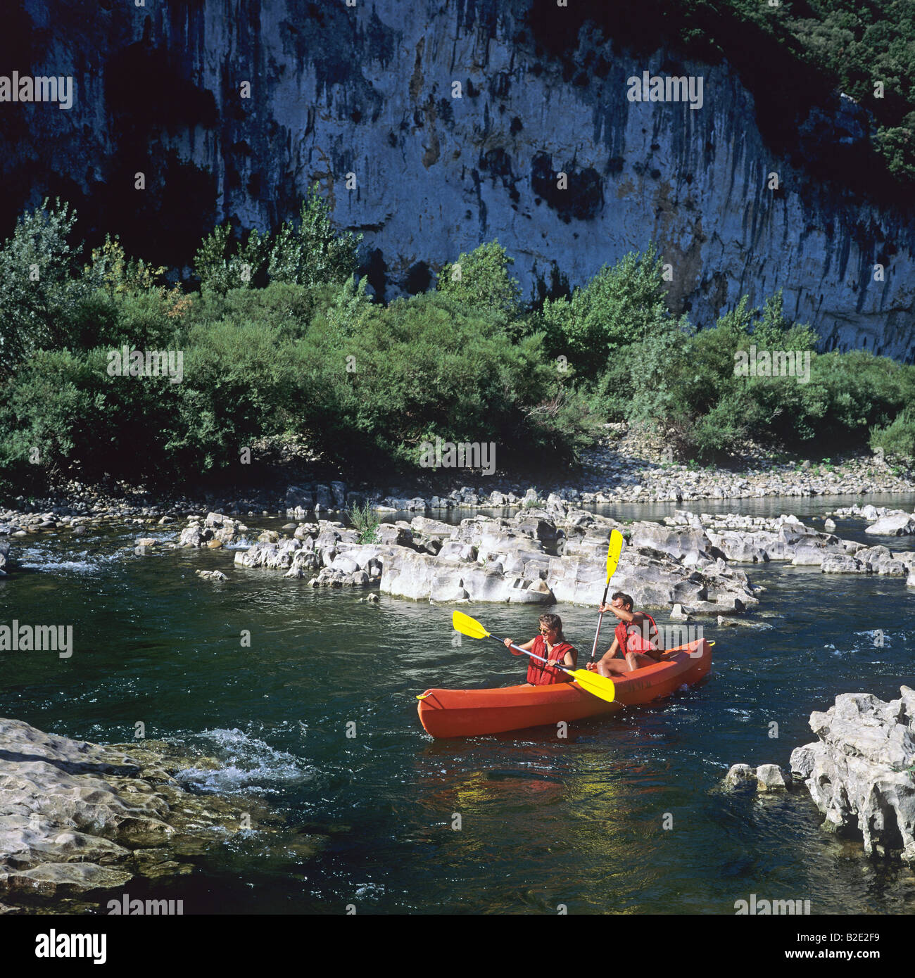 Couple canoeing on Ardèche river de l'Ardèche France Stock Photo