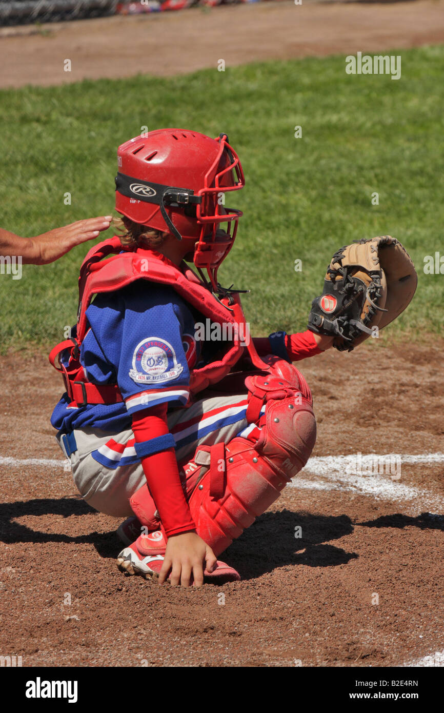 Young little league catcher behind home plate Victoria British Columbia