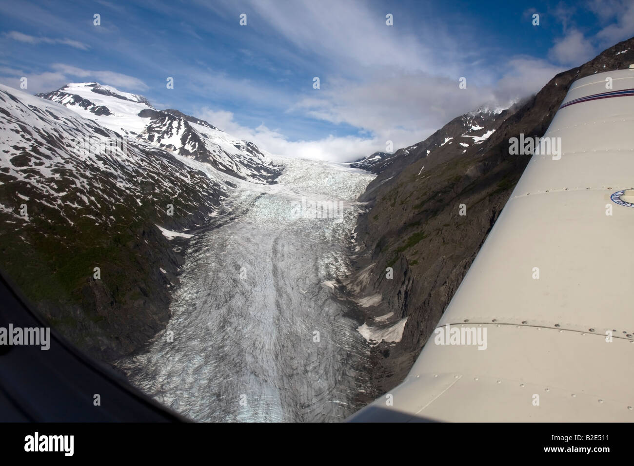 Flight seeing trip with a small air plane plane over the Knik River valley and Knik River Glacier, Alaska, USA Stock Photo