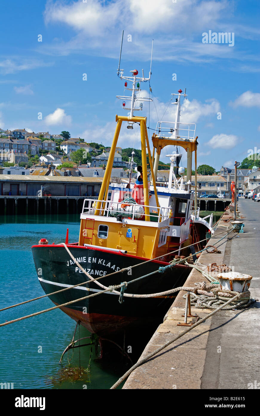 a fishing trawler in the harbour at newlyn near penzance,cornwall,uk