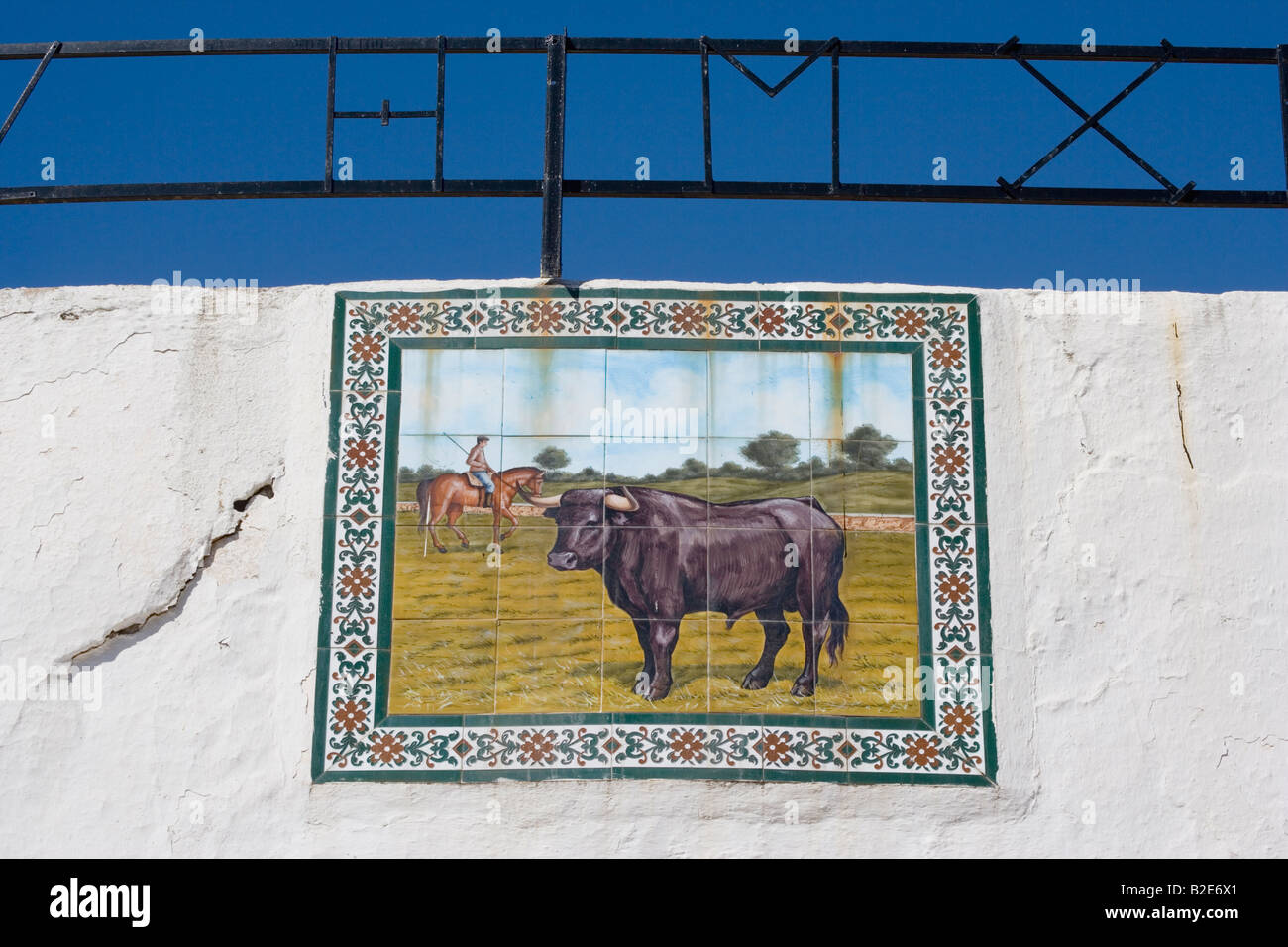 Mijas Malaga Province Costa del Sol Spain Ceramic tile painting of bull in field at bullring