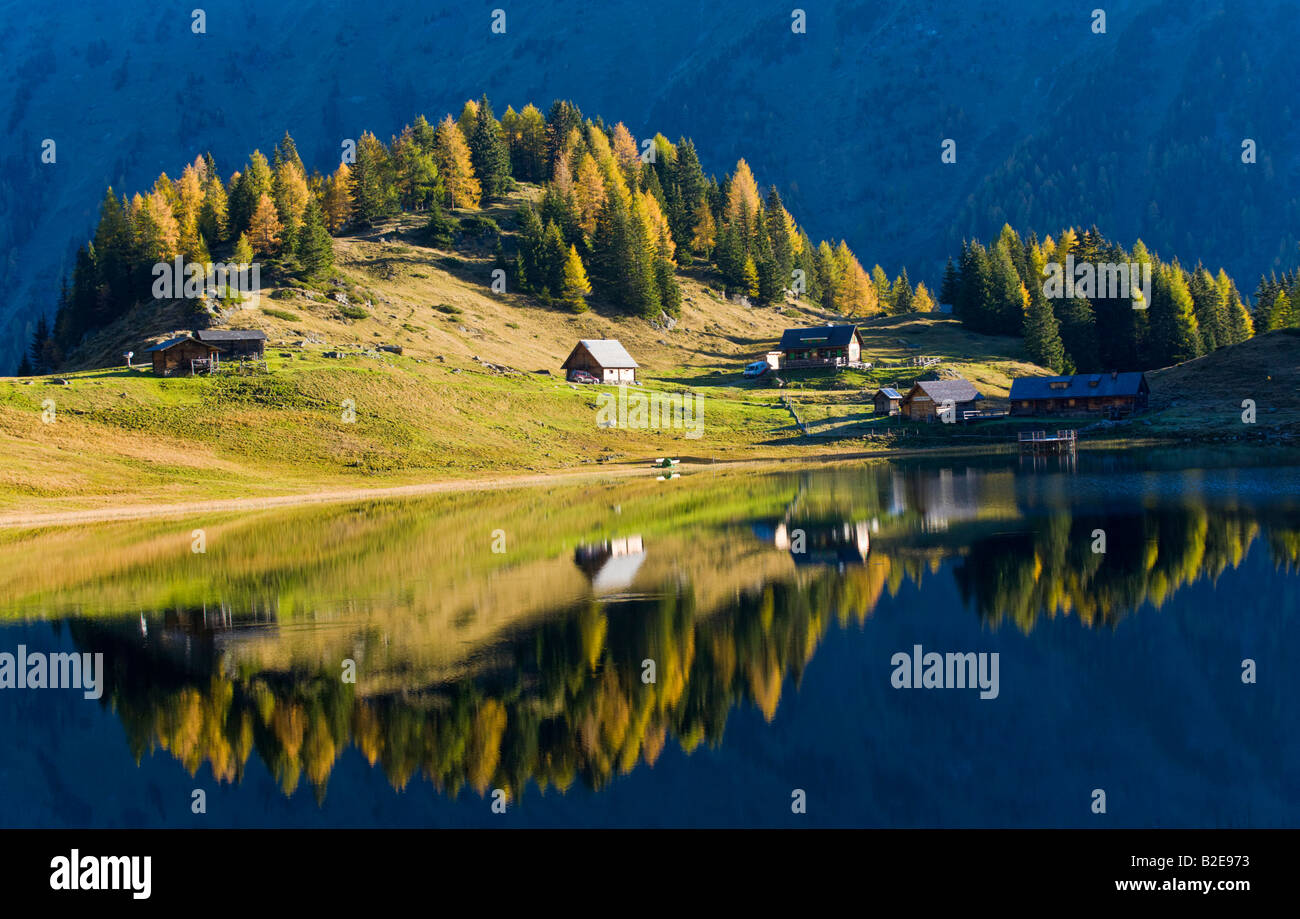 Reflection Of Trees And Log Cabins In Water Duisitzkarsee Niedere
