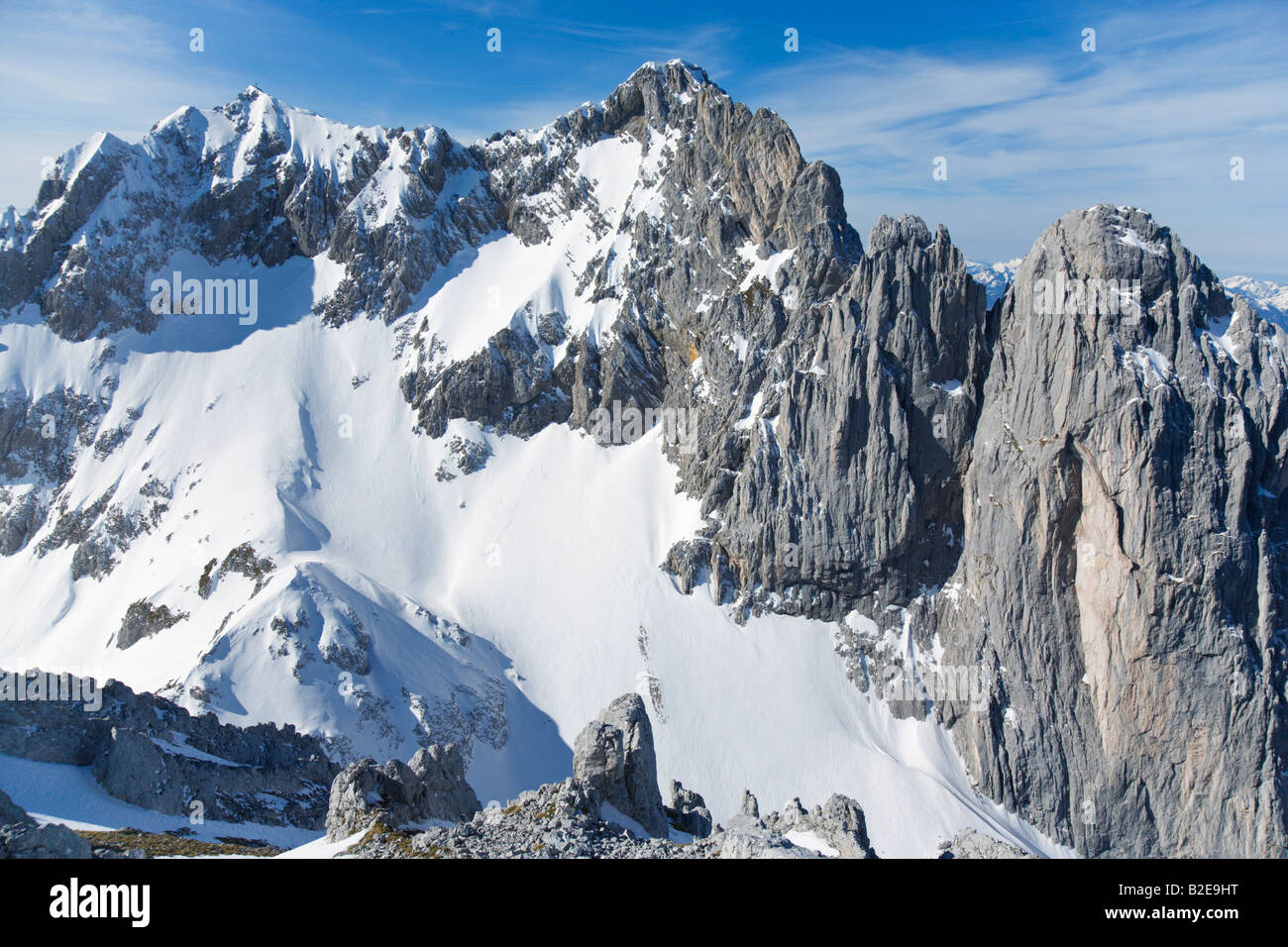 Snowcapped mountain under sky, Wilder Kaiser, Austria Stock Photo