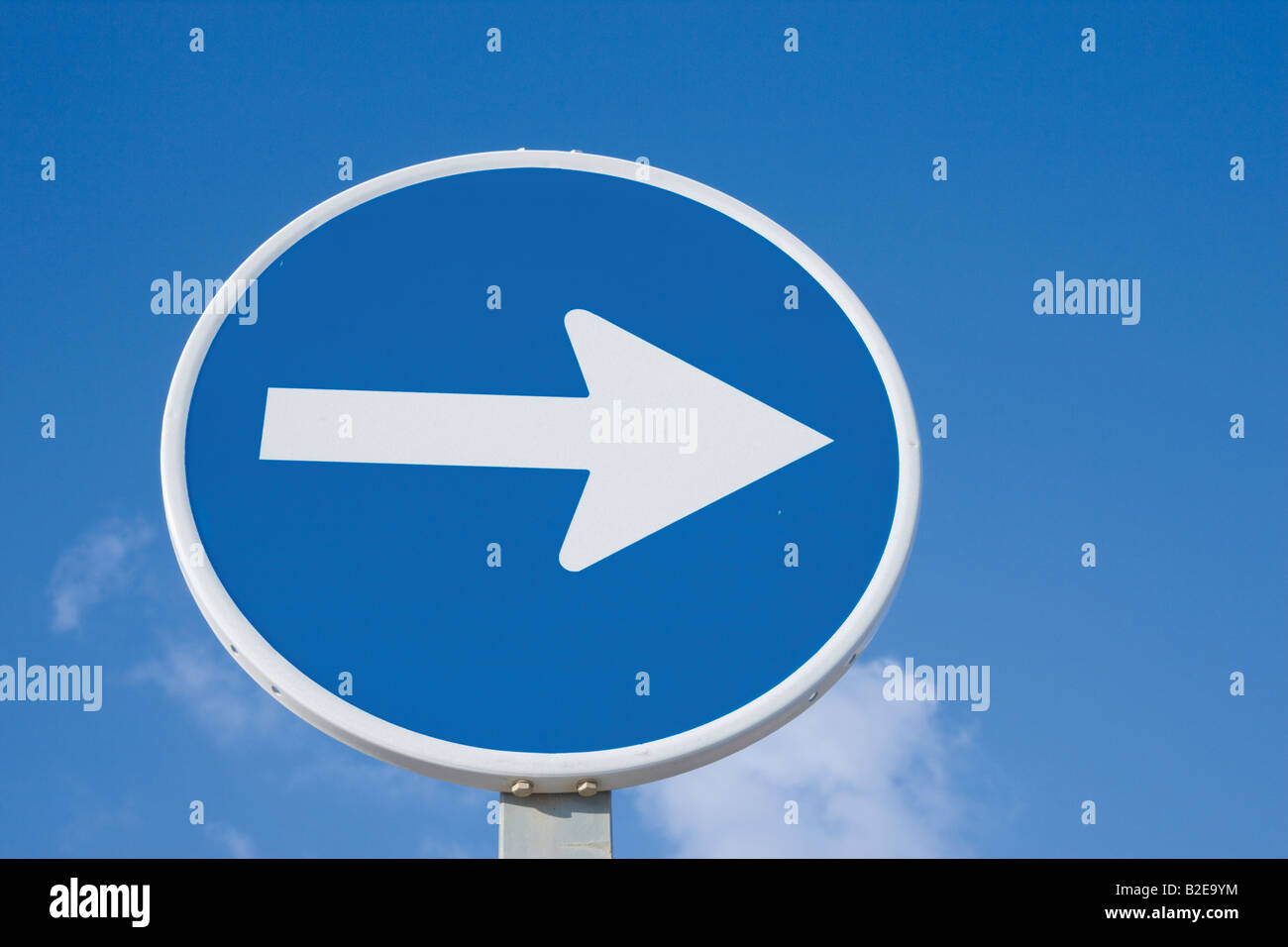 Traffic sign arrow pointing right Stock Photo