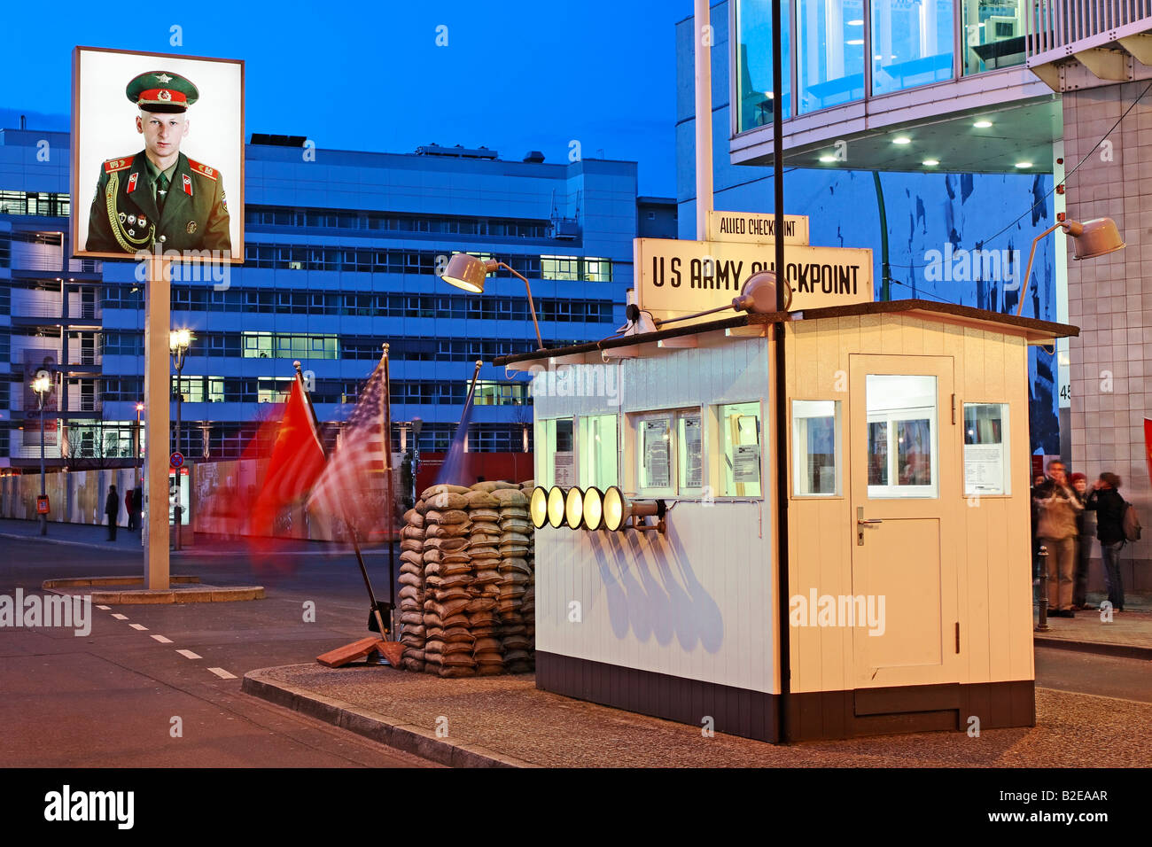 Tourists standing at checkpoint Checkpoint Charlie Berlin Germany Stock Photo