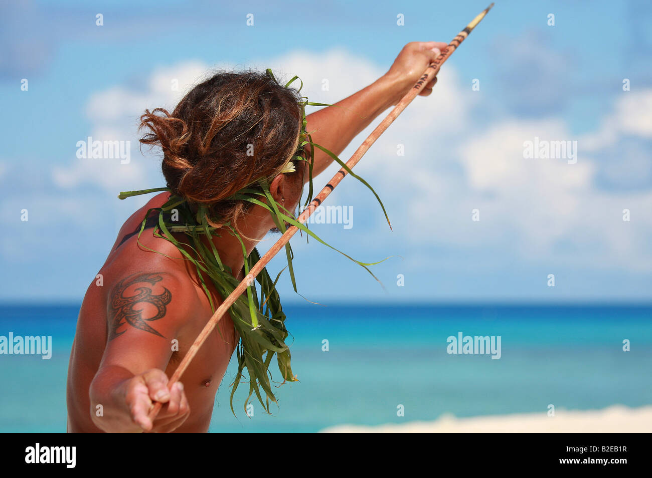 Close-up of male native holding spear, Tuamotus Archipelago, Polynesia Stock Photo