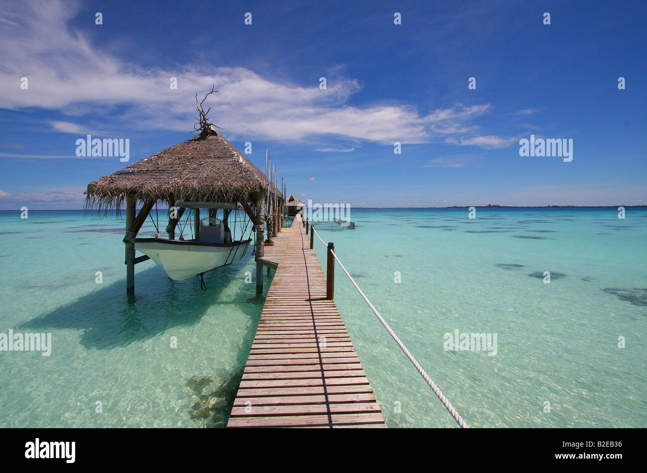 Jetty in shallow water, Tuamotu Archipelago, French Polynesia, Polynesia, Pacific Island Stock Photo