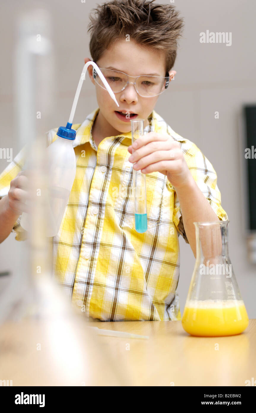 Boy doing science experiments Stock Photo
