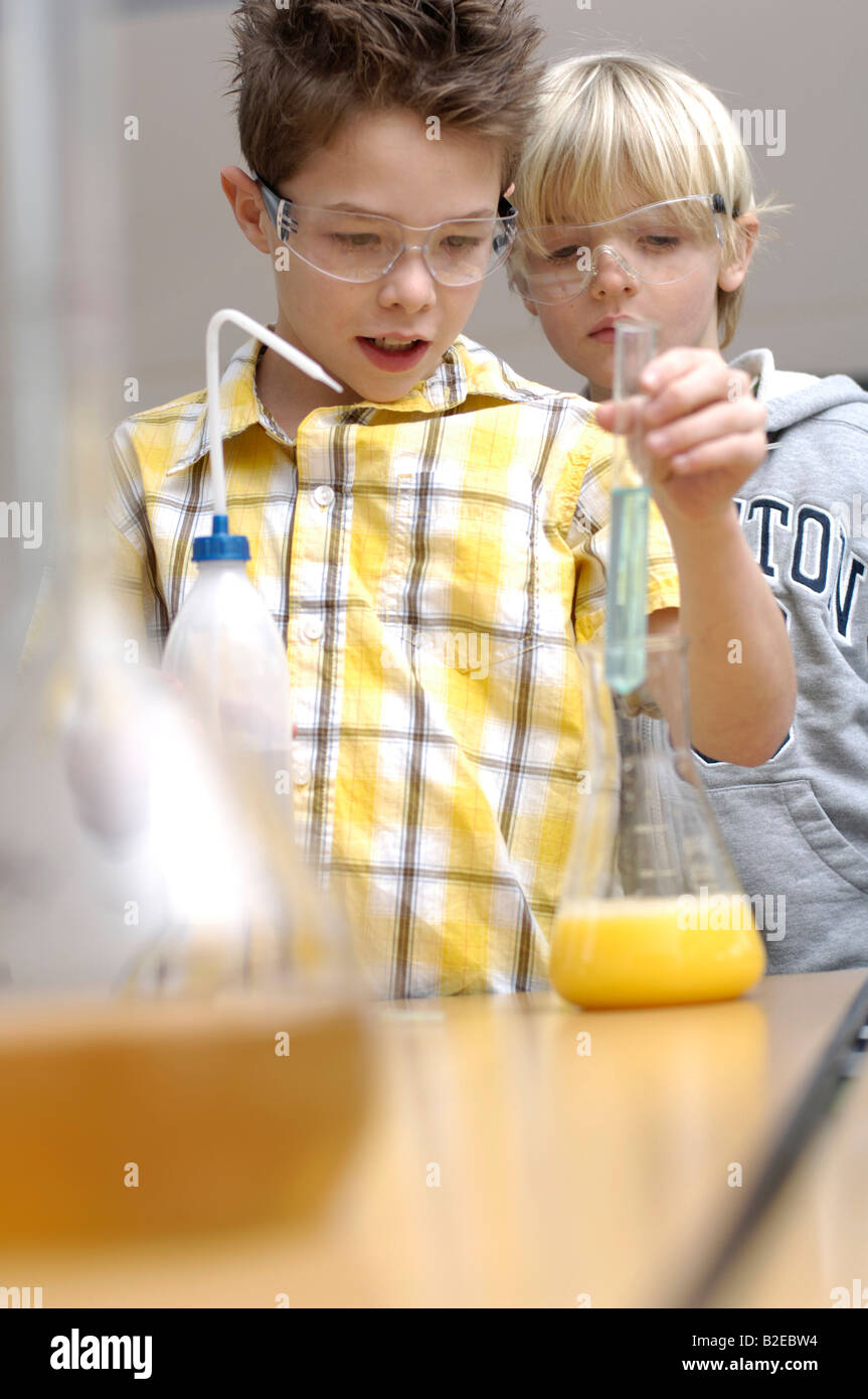 two boys doing science experiments Stock Photo