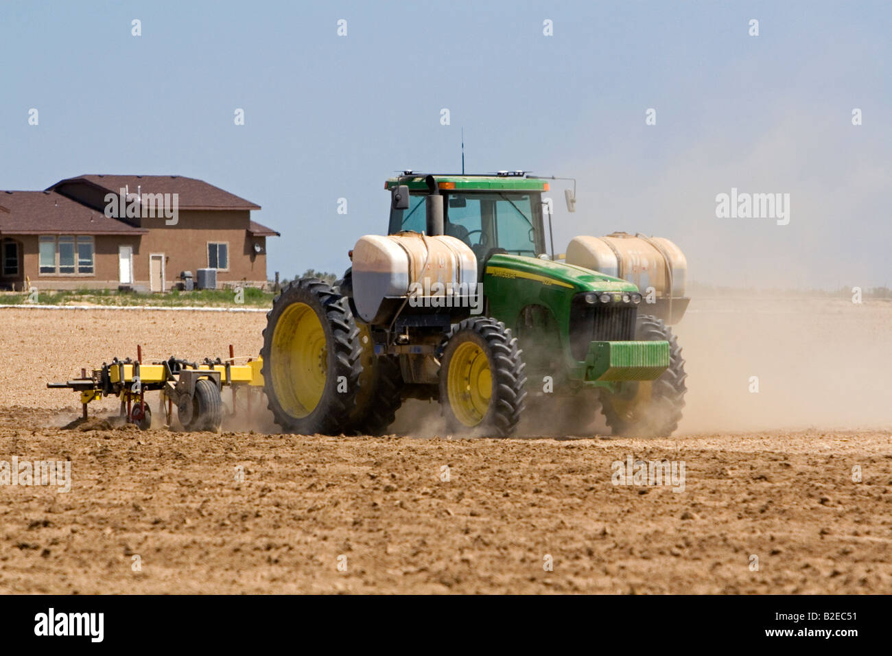Tractor injecting herbicide into crop soil in Canyon County Idaho Stock