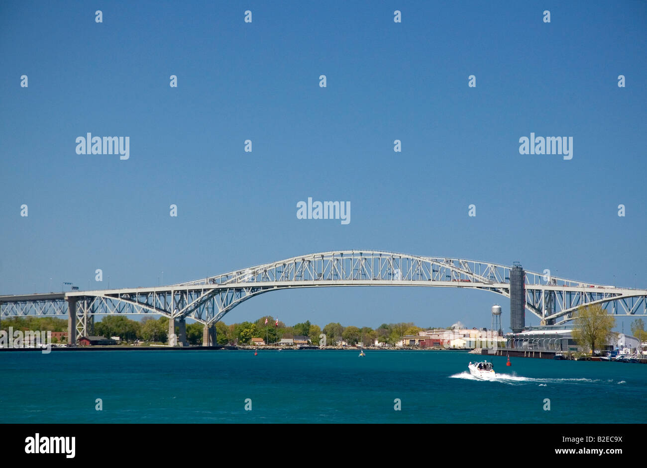 The Blue Water Bridge is a twin span bridge that spans the St Clair River between Port Huron Michigan and Point Edward Ontario Stock Photo