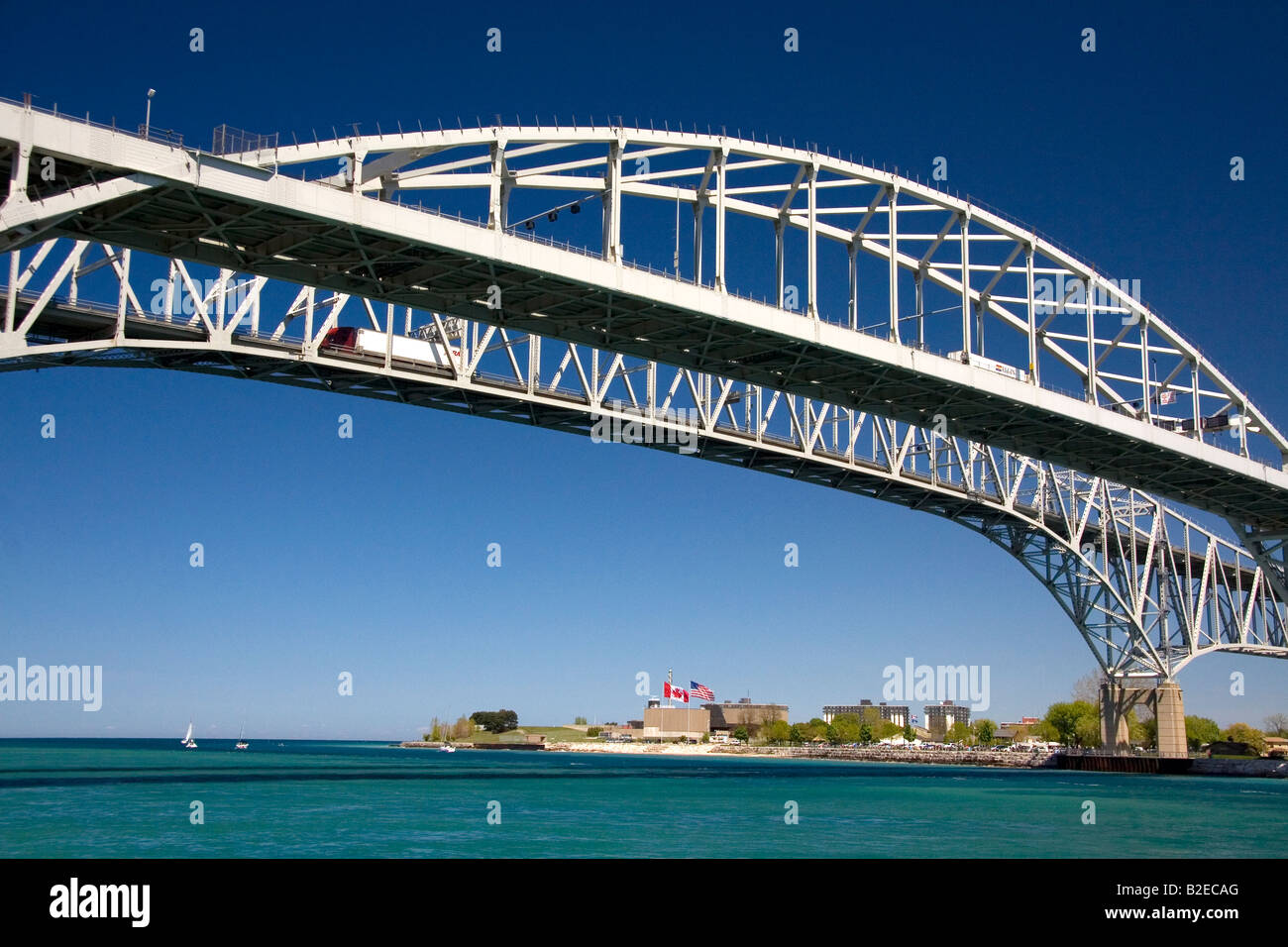 The Blue Water Bridge is a twin span bridge that spans the St Clair River between Port Huron Michigan and Point Edward Ontario Stock Photo