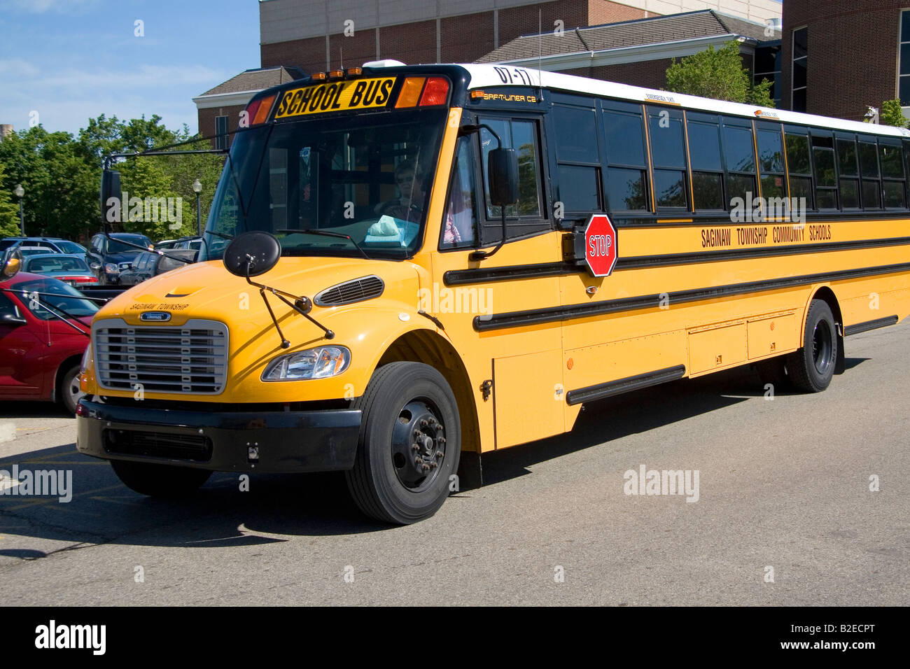 School bus parked outside the Henry Ford Museum in Dearborn Michigan Stock Photo