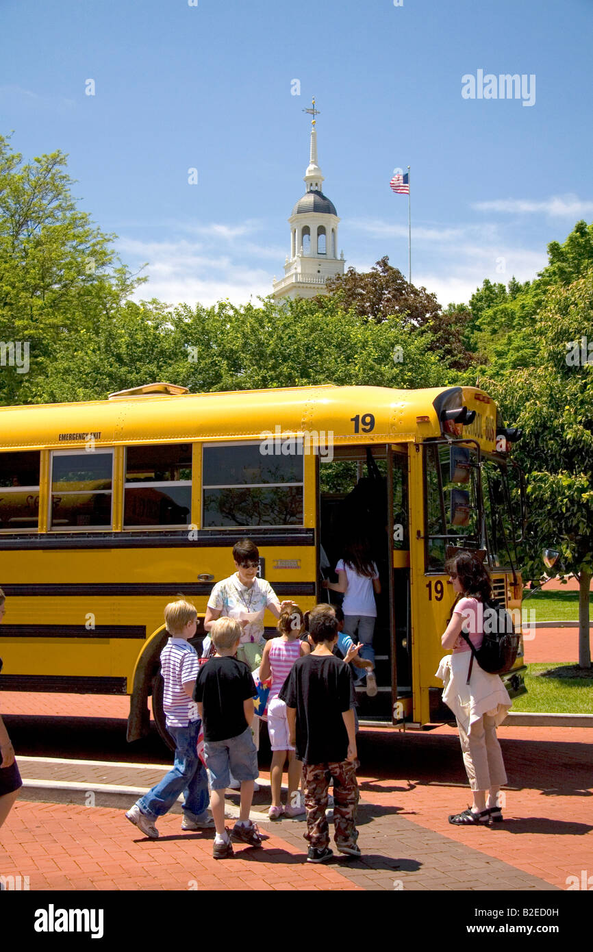 Students board a school bus at The Henry Ford in Dearborn Michigan Stock Photo