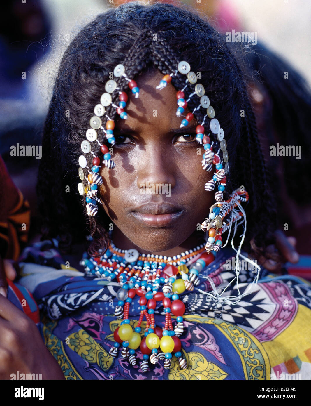 An Afar Girl Has Her Attractive Hairstyle Embellished With Buttons
