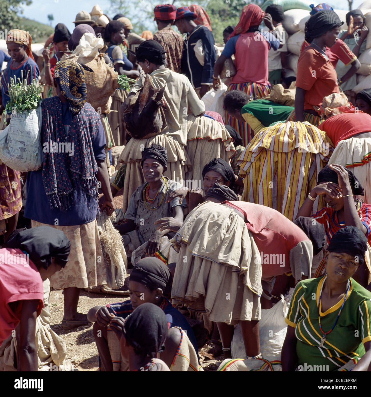 The busy weekly market at Konso trading centre. The women's skirts are made from a thick cotton cloth, called buluko. Stock Photo