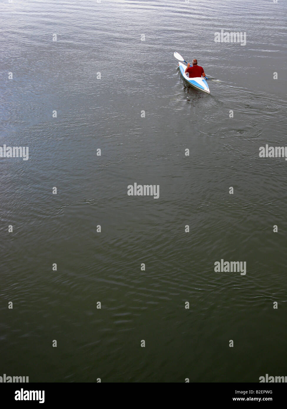 Man in a Canoe Stock Photo - Alamy