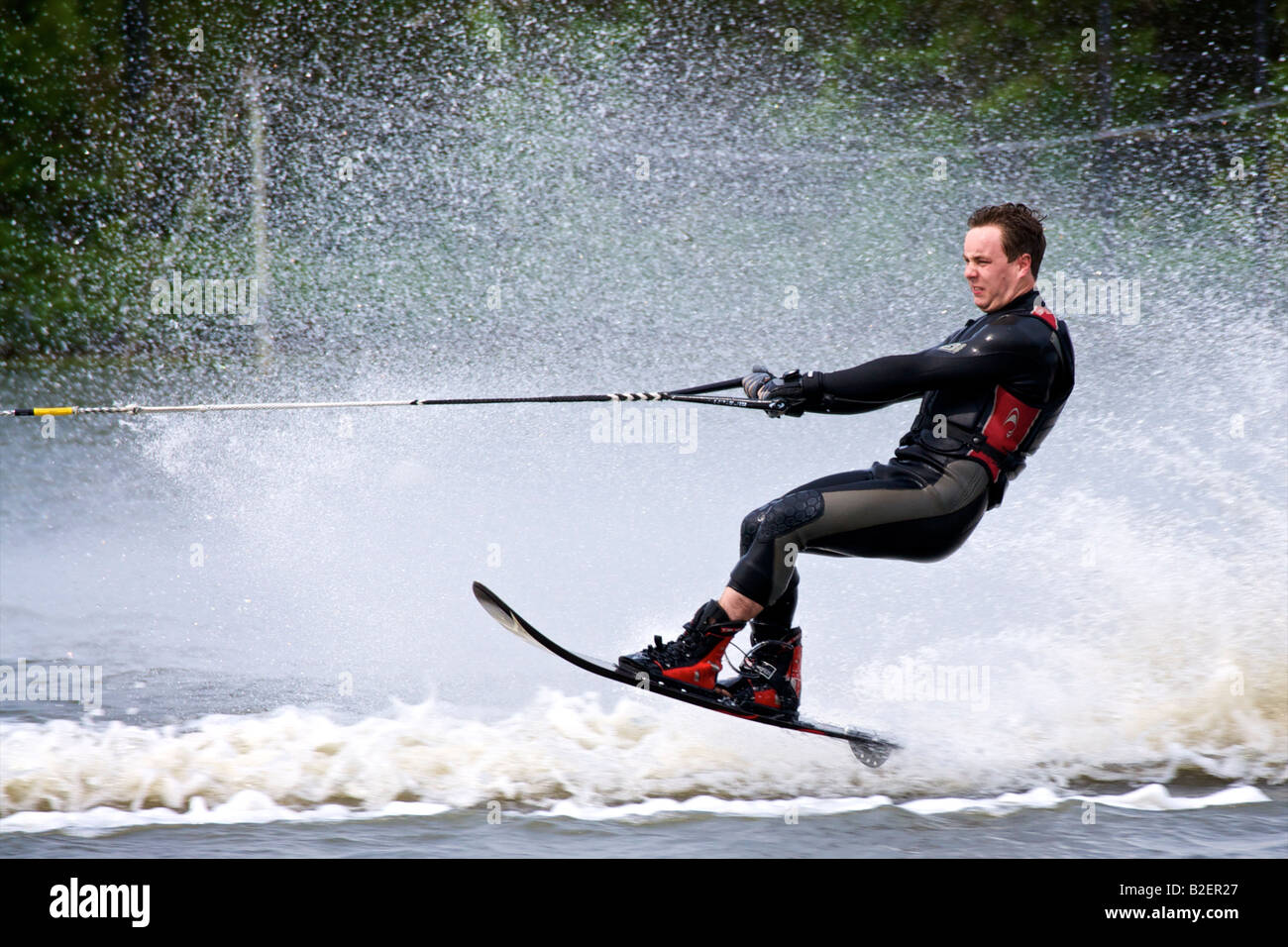 The Scottish National Water Ski Centre , Townhill Country Park, man on slalom ski in air. Stock Photo