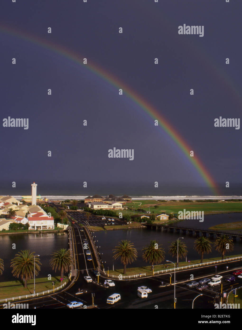 Rainbow on a dark sky hi-res stock photography and images - Alamy