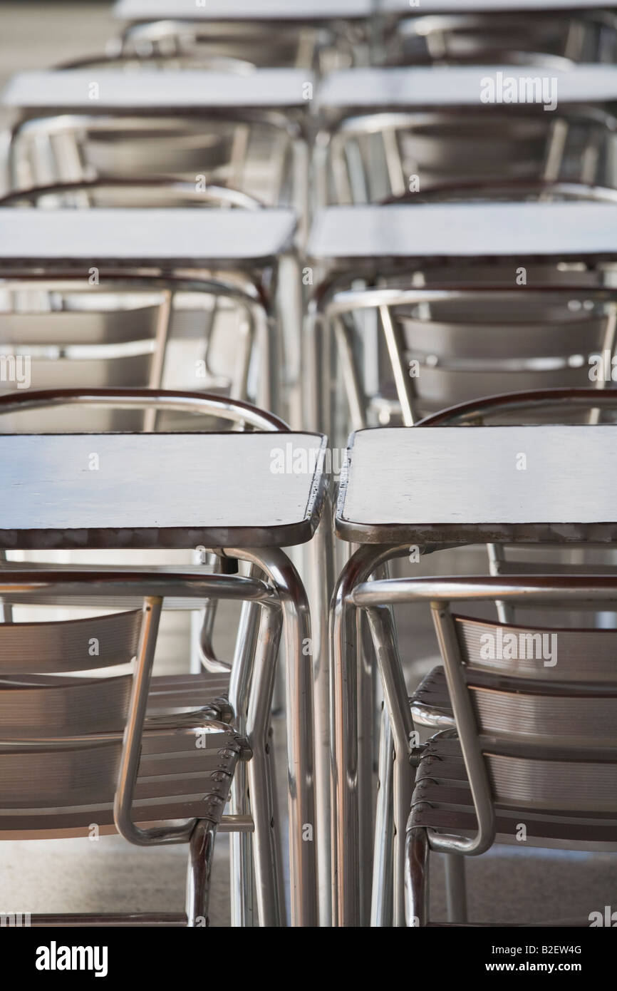 Line of tables and chairs outside restaurant Stock Photo Alamy