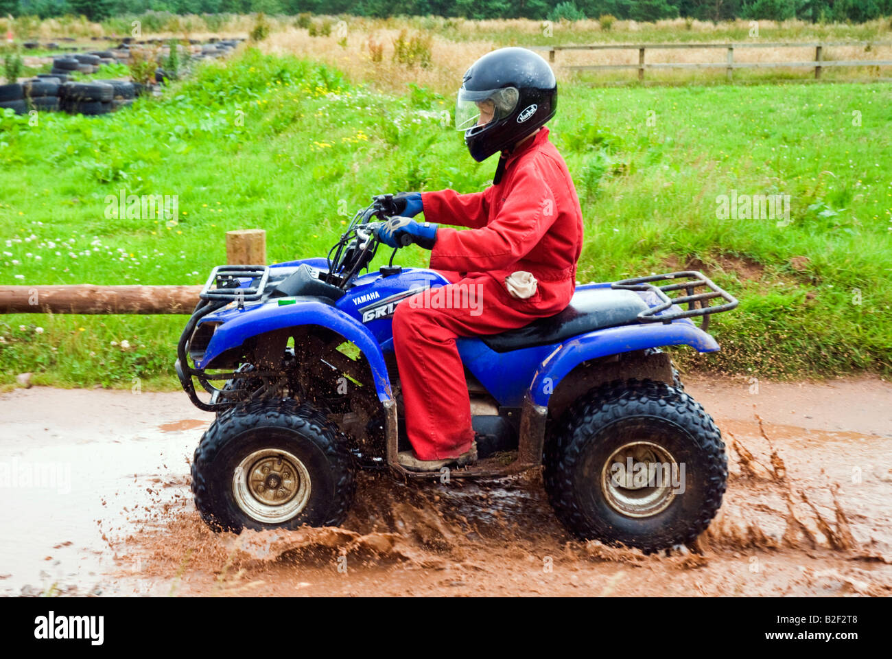 Boy on quad bike for beginners Stock Photo Alamy