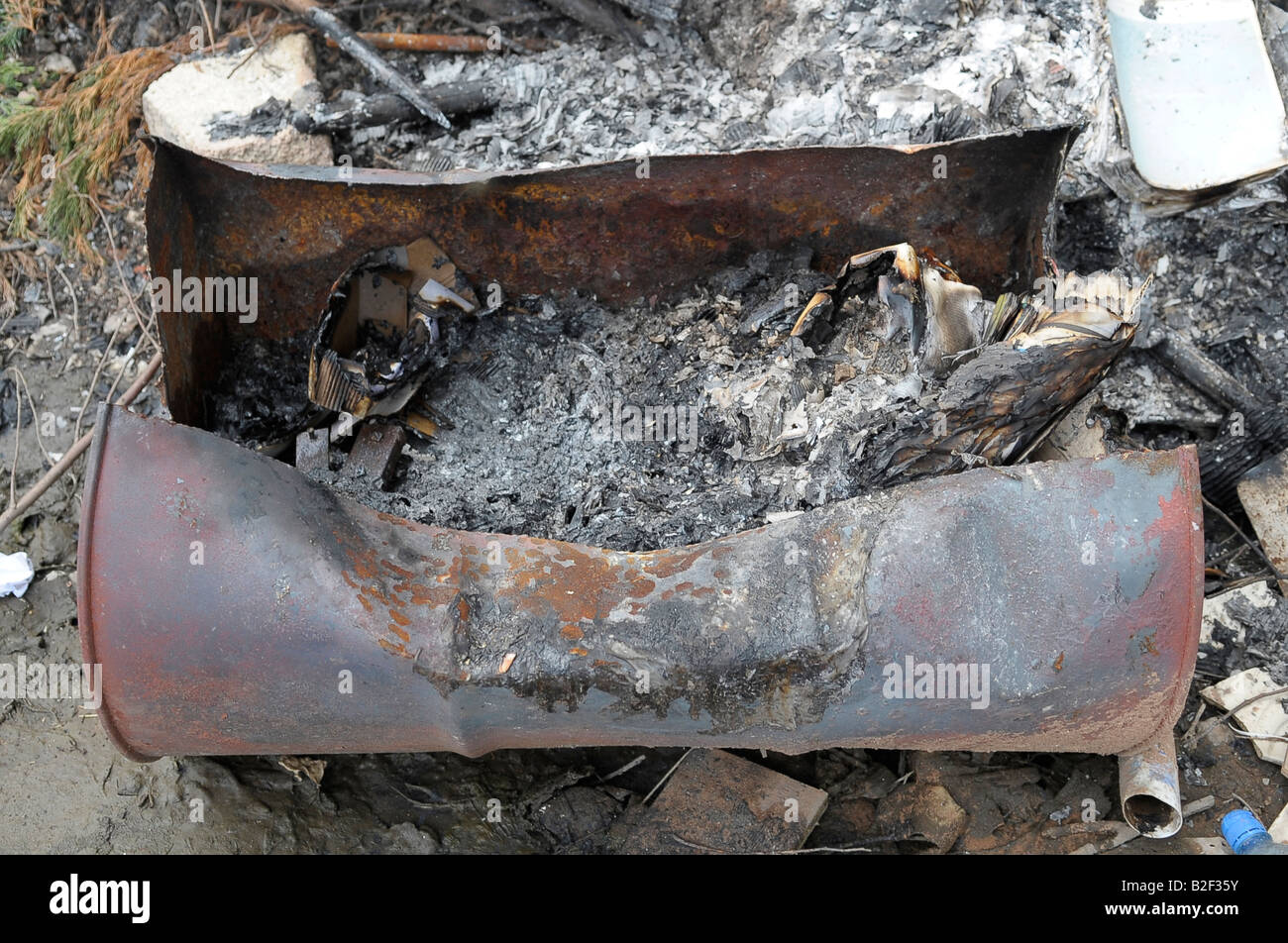 oil drum fire waste building site disposal Stock Photo Alamy