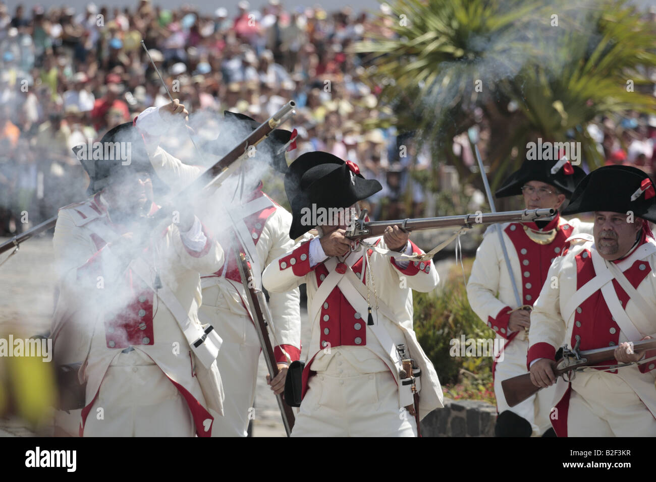 The Batallon de Canarias return fire during a reenactment of the 1797 battle of Santa Cruz, Tenerife Stock Photo