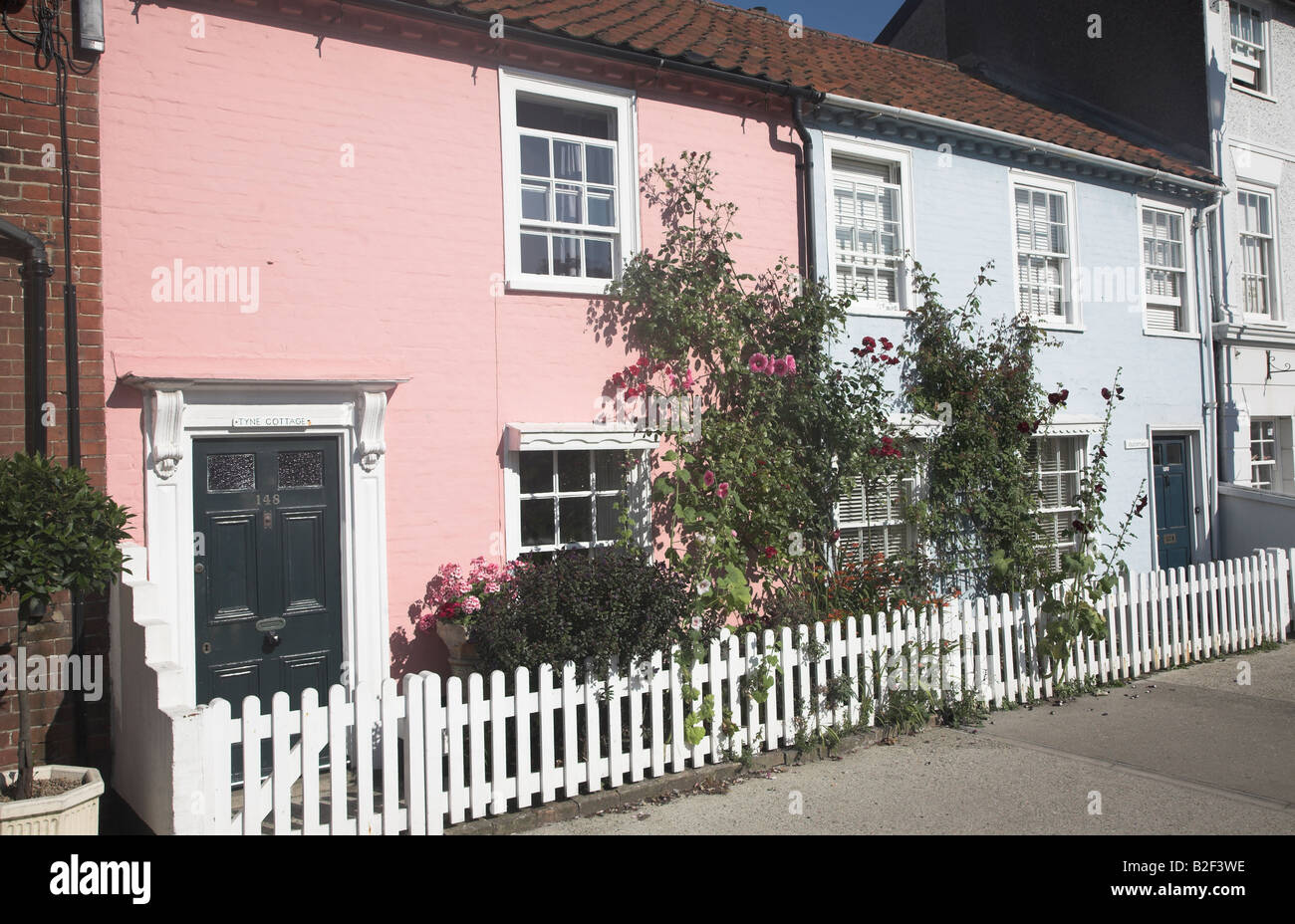 Pink And Blue Terraced Cottages Aldeburgh Suffolk Stock Photo