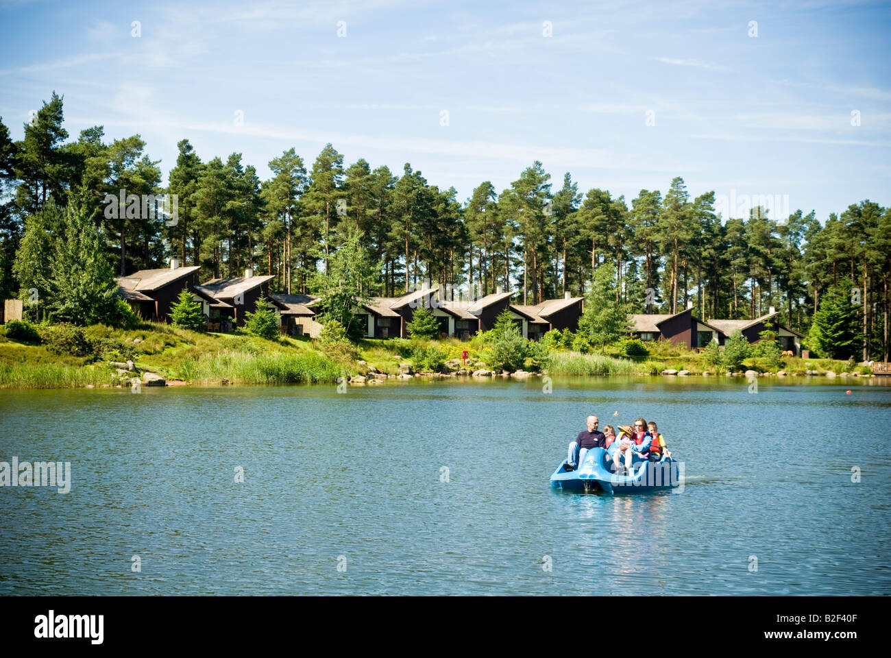 Pedalo on lake at a Centre Parcs holiday centre at Whinfell Forest Cumbria Stock Photo