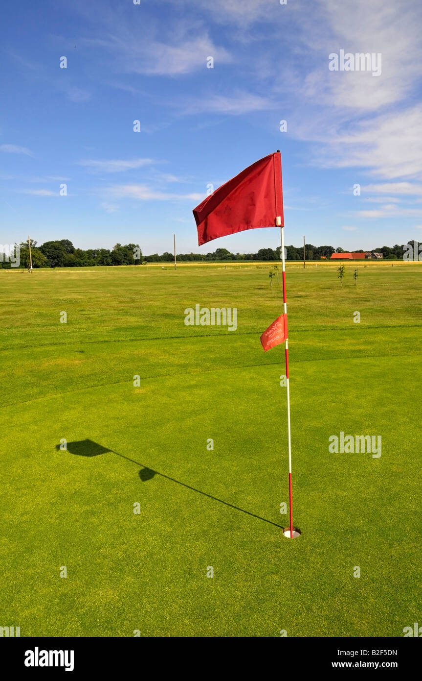 red Flag, golf course, green, hole Stock Photo Alamy