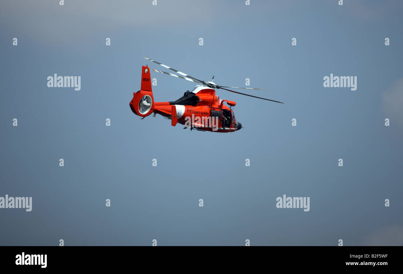 United States Coastguard 'Search & Rescue' Helicopter, circling Liberty Island, New York. Stock Photo