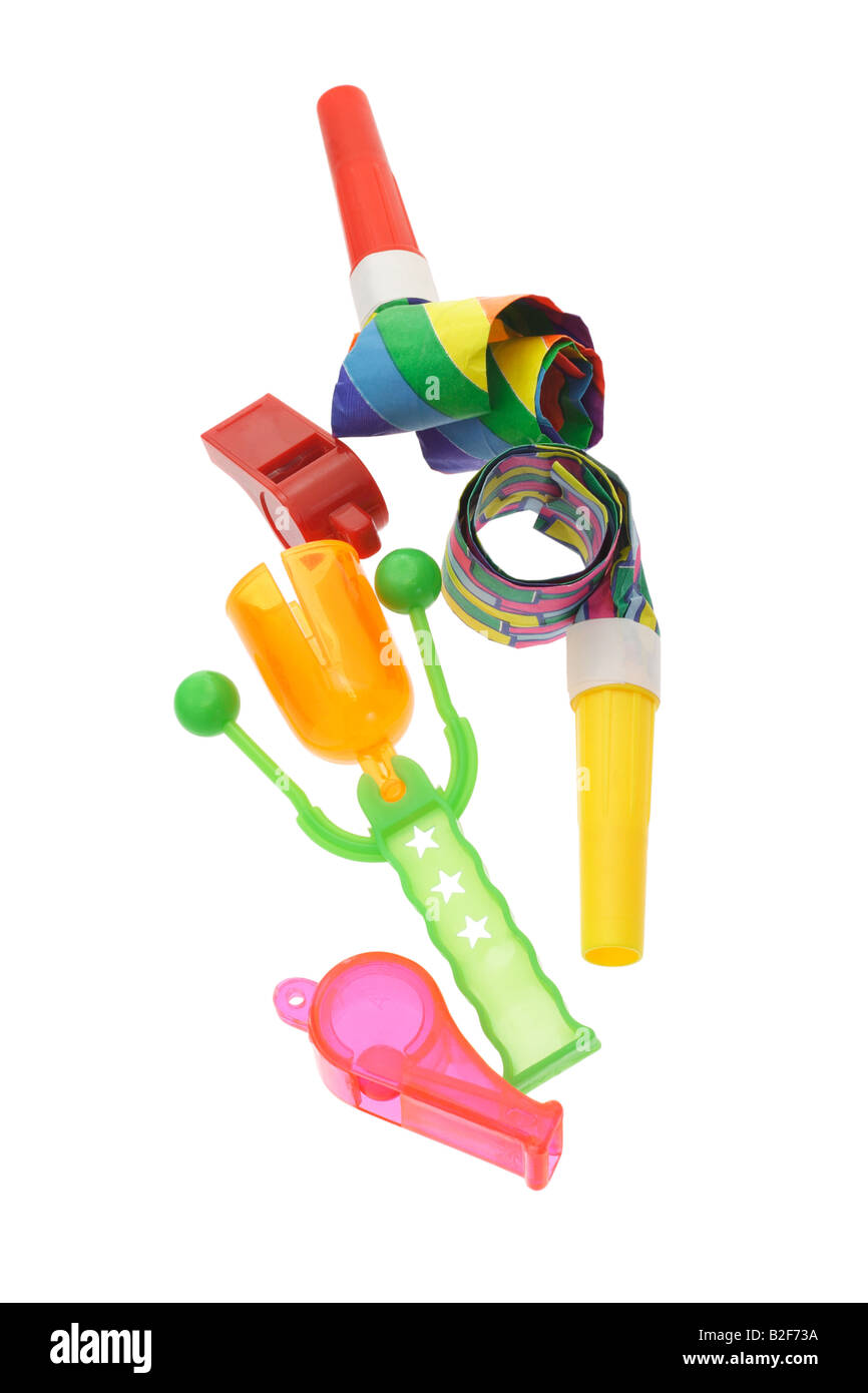 Colorful party horn blowers whistles and click clack on white Stock ...