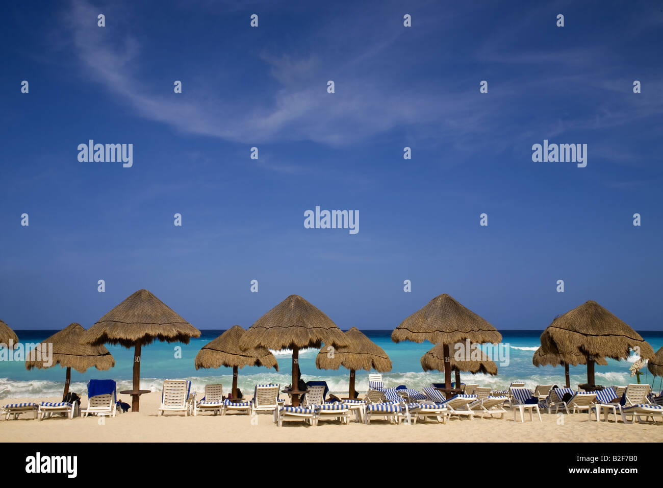 A bunch of people sunbathing at the beach Stock Photo