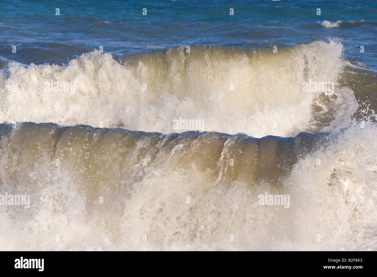 Wild waves crashing on shore Stock Photo