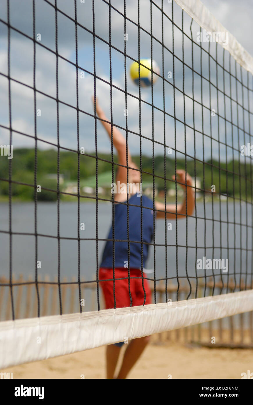 Man serves in Beach Volleyball game Stock Photo Alamy