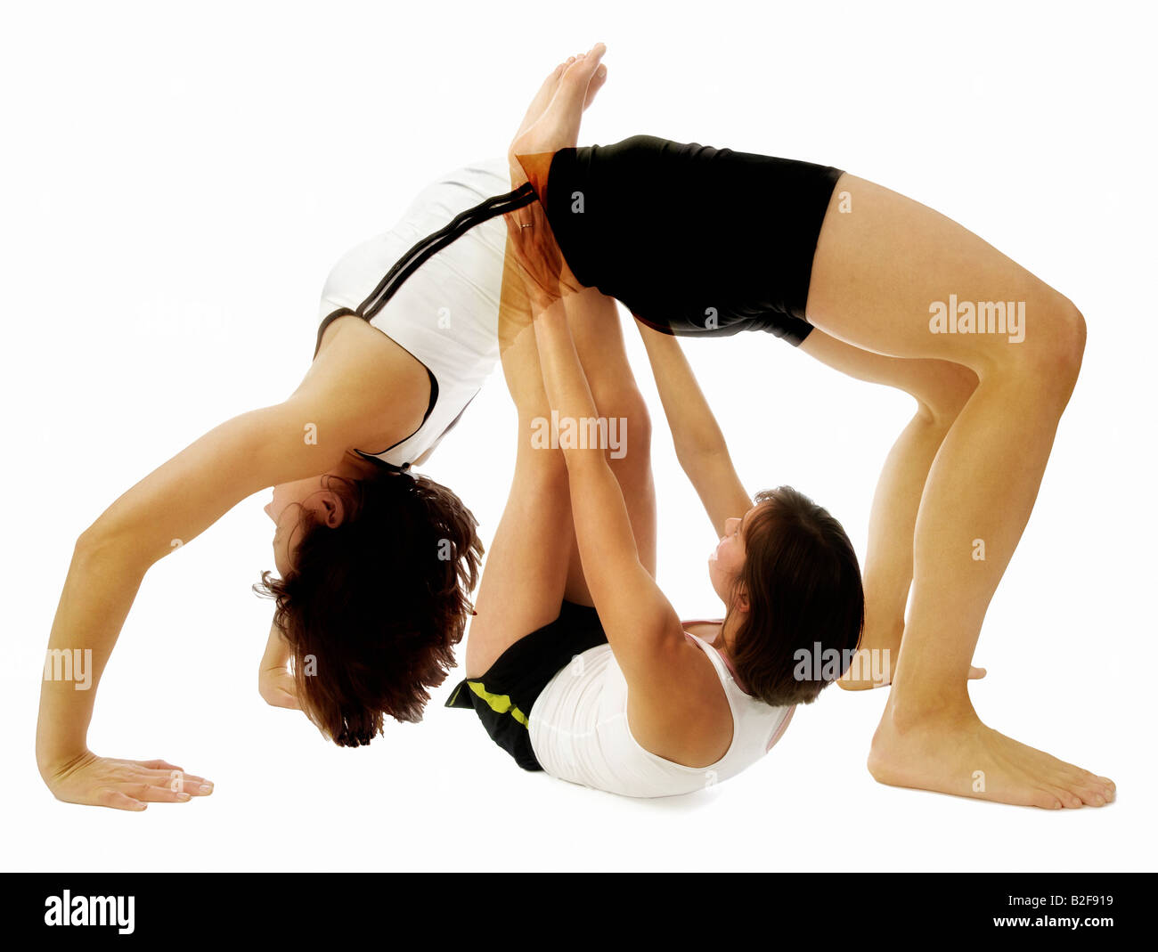 Young Woman exercising Pilates and Fitness Stock Photo