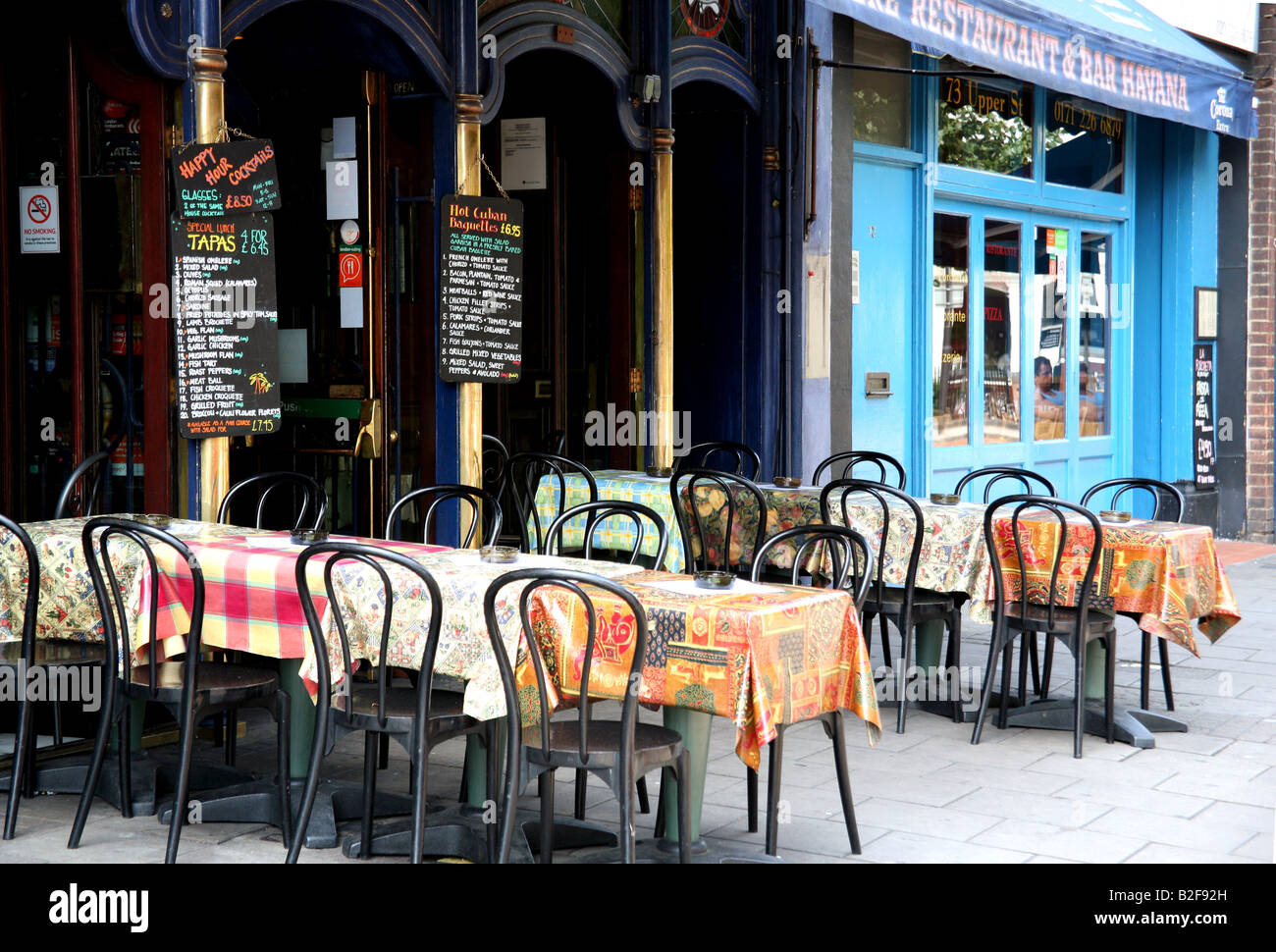 Empty restaurant tables in London during economic downturn Stock Photo